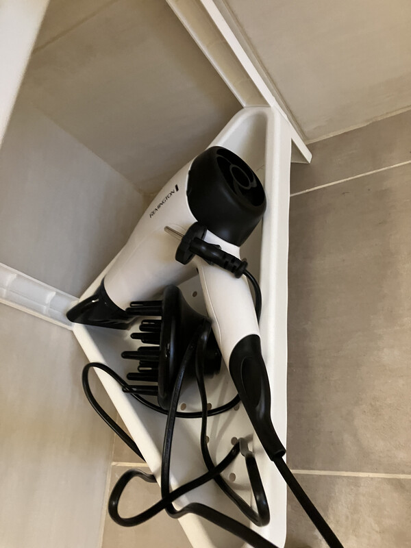 Hair dryer in the bathroom